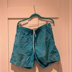 Polo Ralph Lauren Mens Blue Mesh Lined Swim Trunks with Yellow Pony Logo